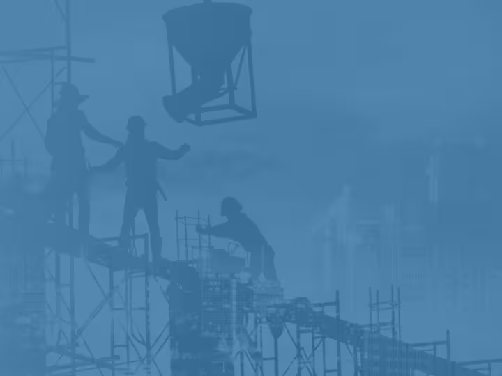 Construction workers on a job site with a faded blue filter.