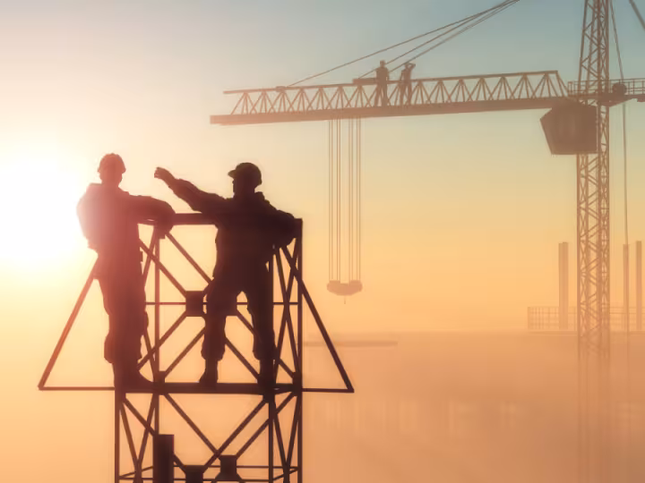 construction workers looking at the horizon